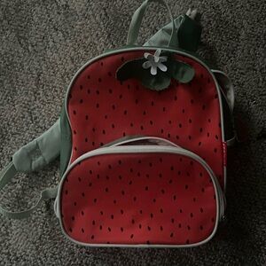 small vintage strawberry backpack